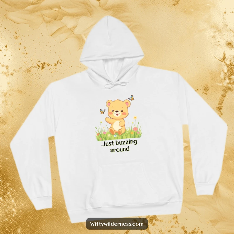 Funny hoodie featuring a happy bear cub joyfully pursuing a butterfly in a lush meadow, capturing a moment of pure, innocent fun.